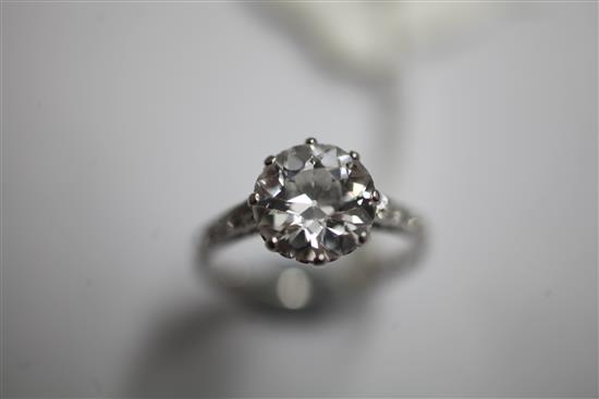 A 1940s/1950s platinum and single stone diamond ring with diamond set shoulders, size L.